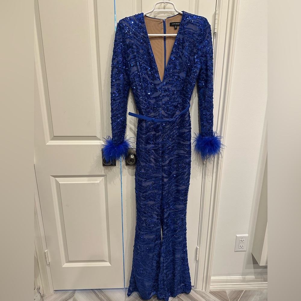 Nadine Merabi SM Elegant Blue Sequin jumpsuit with Feather Cuffs